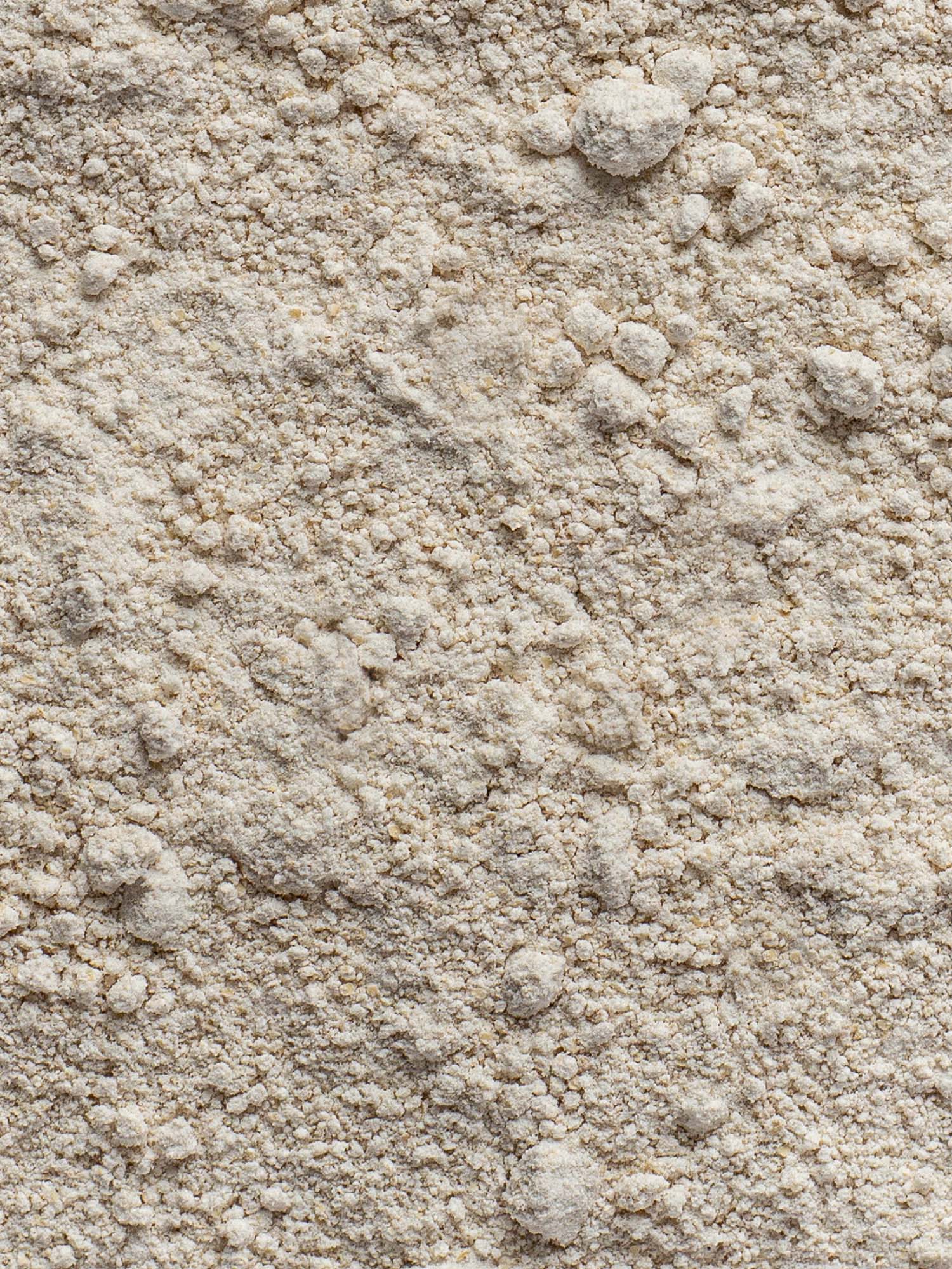 Detailansicht des Hafer Vollkornmehls, um die Struktur des Produktes zu erkennen.